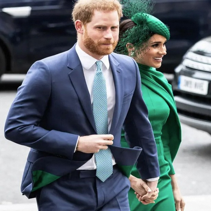 navy suit with green dress